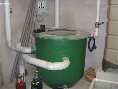 Grey water flow control tank